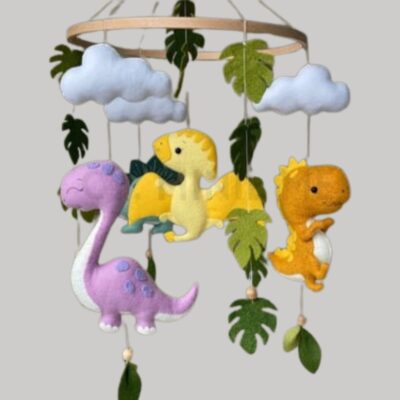 Colgante para cuna con diseño de dinosaurios
