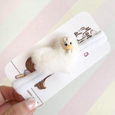 Vincha para bebé con corazón de peluche y aplique de porcelana unicornio